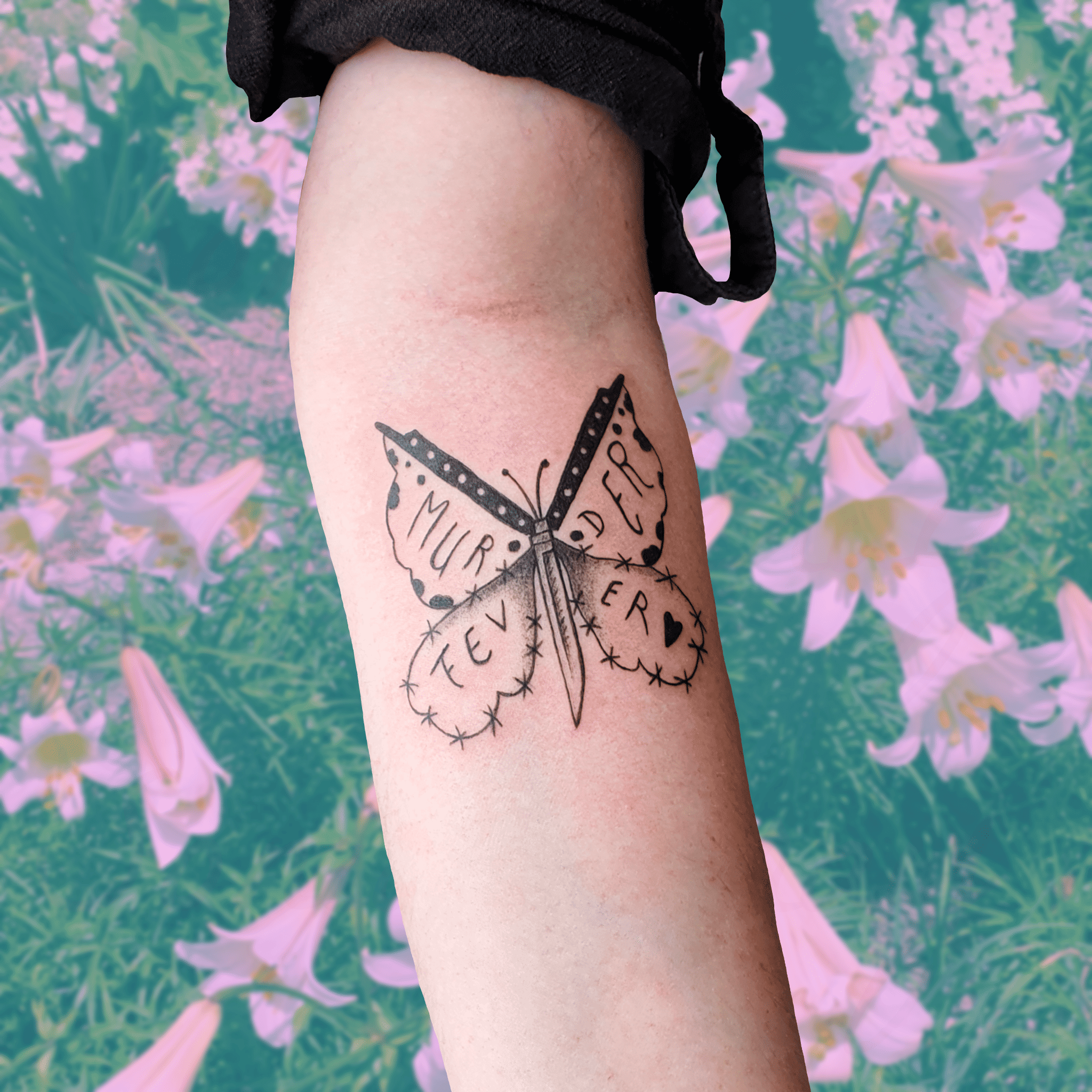 Photo tatouage d'un papillon couteau